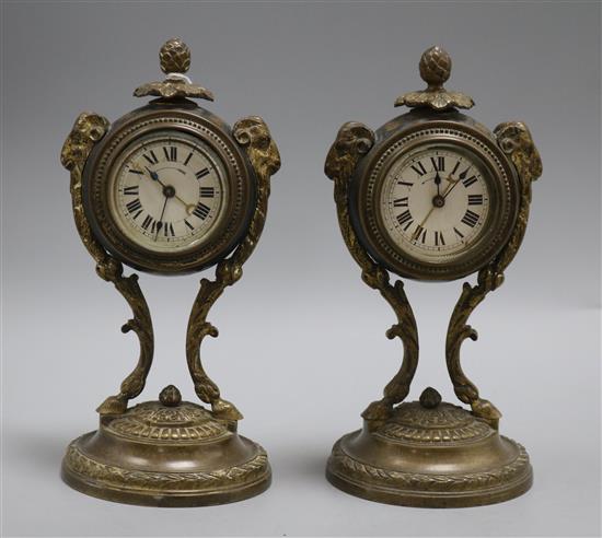 A pair of French bronze timepieces Height 23cm